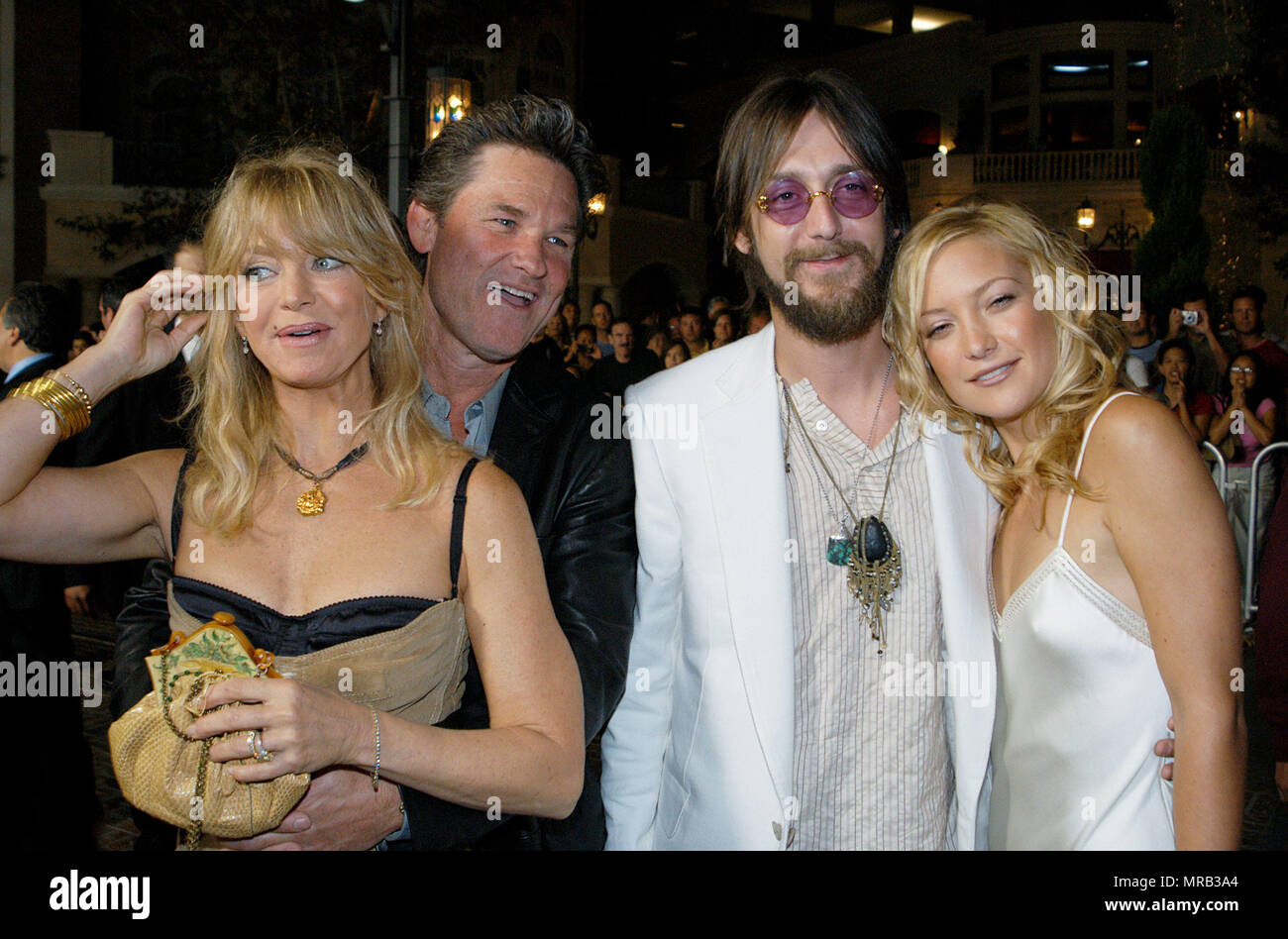 Goldie Hawn and hubby Kurt Russell posing with daughter Kate Hudson and husband Chris Robinson at the premiere of Banger Sisters at the new complex mall and theatre the Groves in Los Angeles. September 19, 2002. Red Carpet Event, Vertical, USA, Film Industry, Celebrities,  Photography, Bestof, Arts Culture and Entertainment, Topix Celebrities fashion , Best of, Event in Hollywood Life - California,  Red Carpet, USA, Film Industry, Celebrities,  movie celebrities, TV celebrities, Music celebrities, Photography,  Arts Culture and Entertainment,   , inquiry tsuni@Gamma-USA.com , vertical, several Stock Photo