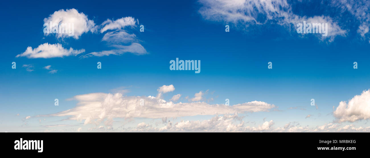 panorama of beautiful cloudscape on a blue sky. wonderful summer weather background Stock Photo