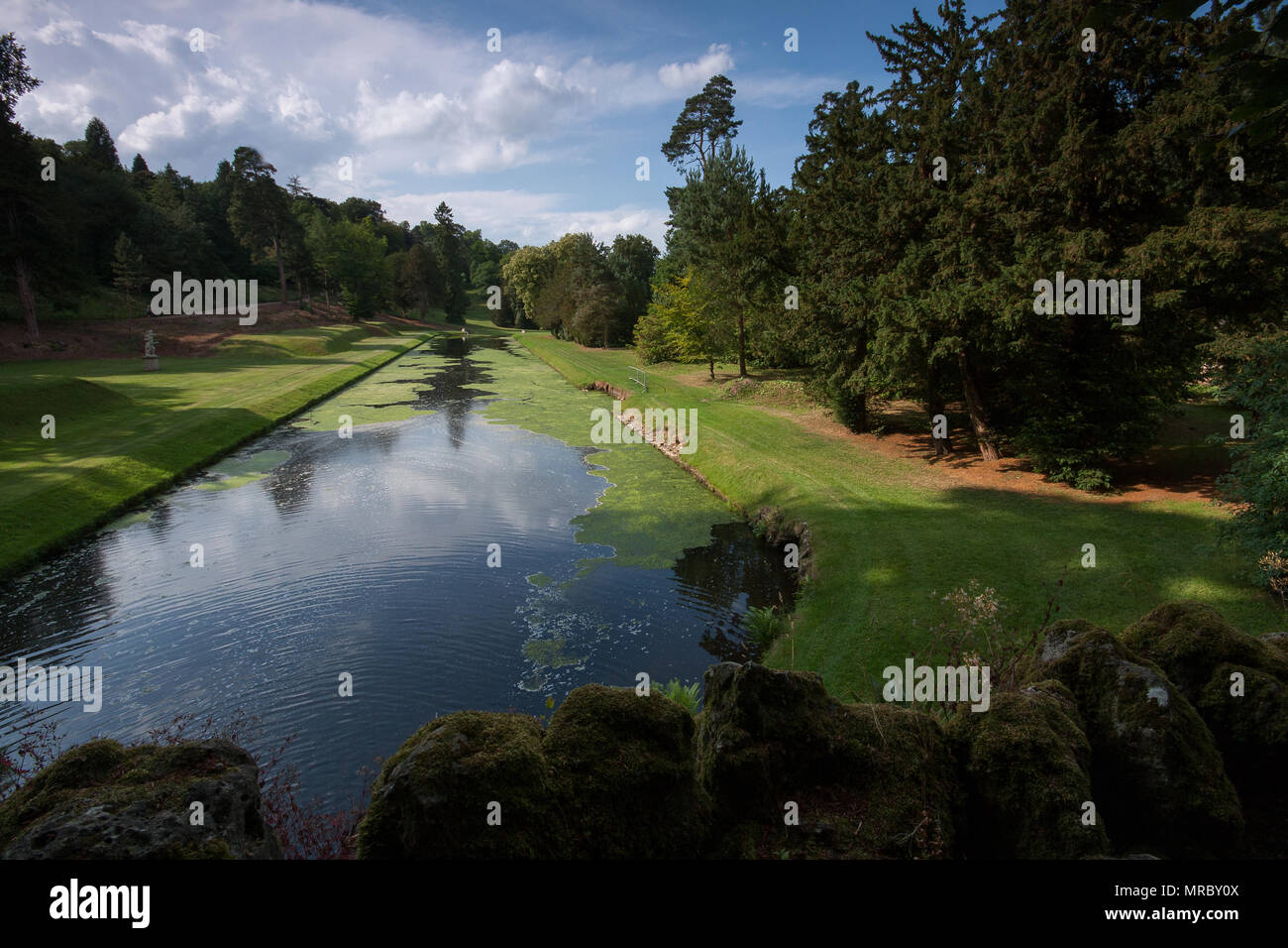 River Skell passing in the middle of the garden in Fountains Abbey ...
