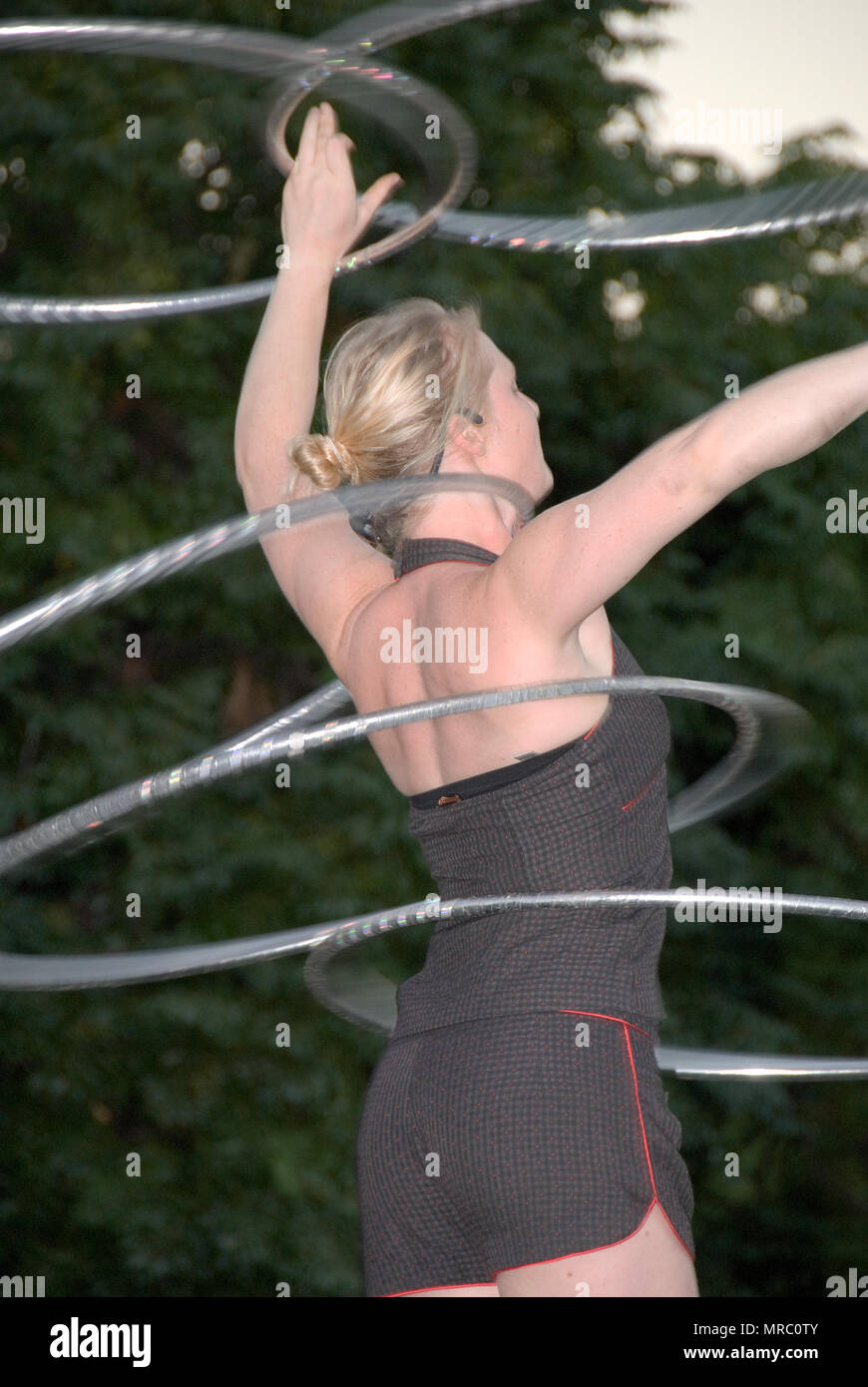 Woman performing with hoops, Adelaide Fringe Festival, South Australia Stock Photo