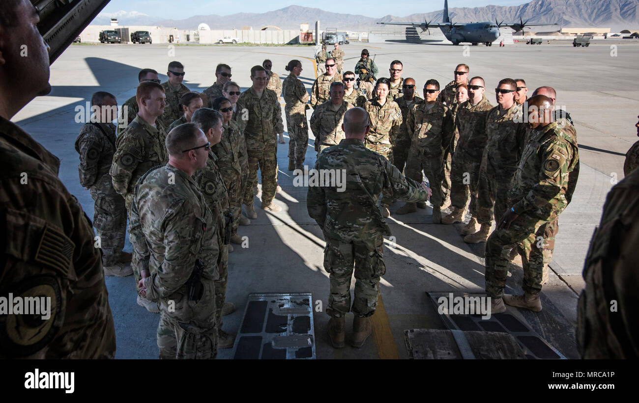 Air Force Vice Chief of Staff Gen. Stephen W. Wilson thanks members of the 455th Air Expeditionary Wing during a tour of a C-130J Hercules April 13, 2017 at Bagram Airfield, Afghanistan. Wilson and Chief Master Sgt. of the Air Force Kaleth O. Wright visited Bagram as part of a tour of several locations in the U.S. Central Command area of responsibility. Stock Photo