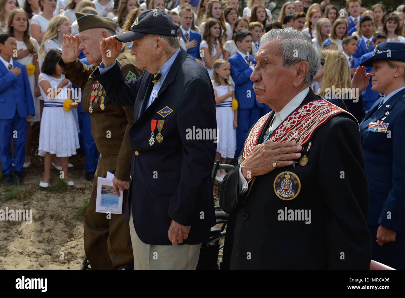 Charles Shay and other DDay veterans observe colors during the Charles