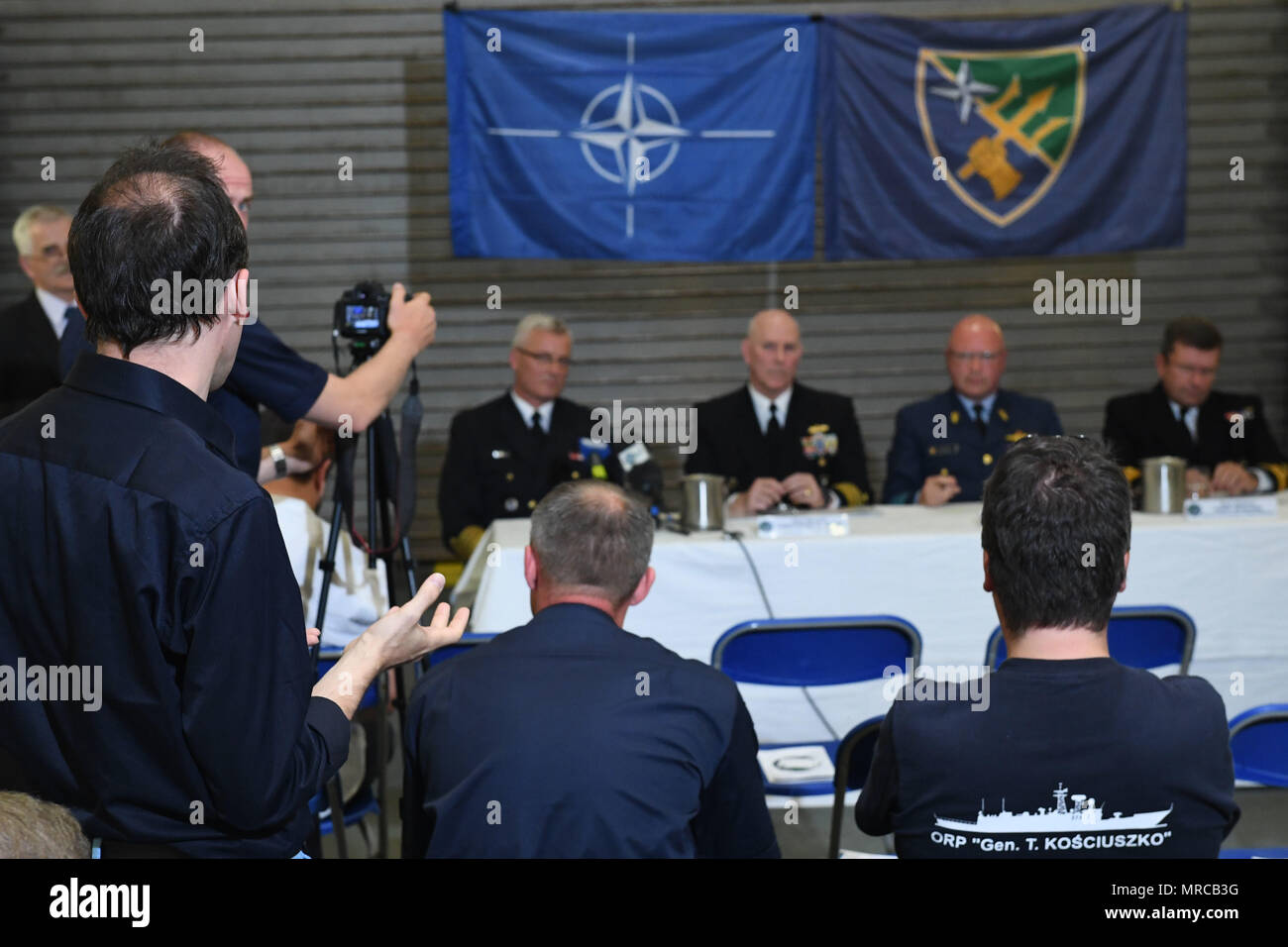 170603-N-JI086-480 - SZCZECIN, Poland (June 3, 2017) A member of the Polish media asks members of the Naval Striking and Support Forces NATO leadership a question at a press conference aboard the Danish Absalon-class combat support ship HDMS Absalon (L16) during the pre-sail portion of exercise BALTOPS 2017, June 3, 2017. BALTOPS is an annual U.S.-led, Naval Striking and Support Forces NATO-executed, multinational maritime exercise in the Baltic Sea region designed to enhance flexibility and interoperability among its participants. (U.S. Navy photo by Mass Communication Specialist 3rd Class Fo Stock Photo