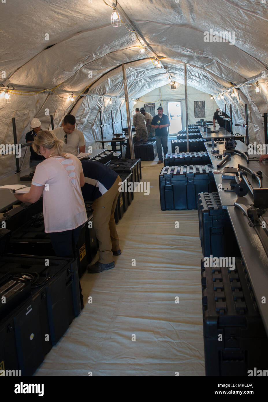 Members of the 726th Air Control Squadron assemble their new TYQ-23A Control and Reporting Center May 30, 2017, at Mountain Home Air Force Base, Idaho. The smaller, less bulky equipment makes transportation and use easier. (U.S. Air Force photo by Airman 1st Class Jeremy D. Wolff/Released) Stock Photo