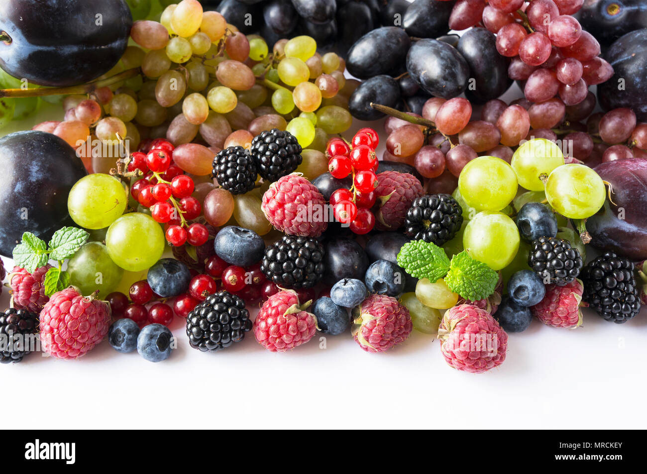 Ripe blackberries, blueberries, raspberries, red currants, grapes and