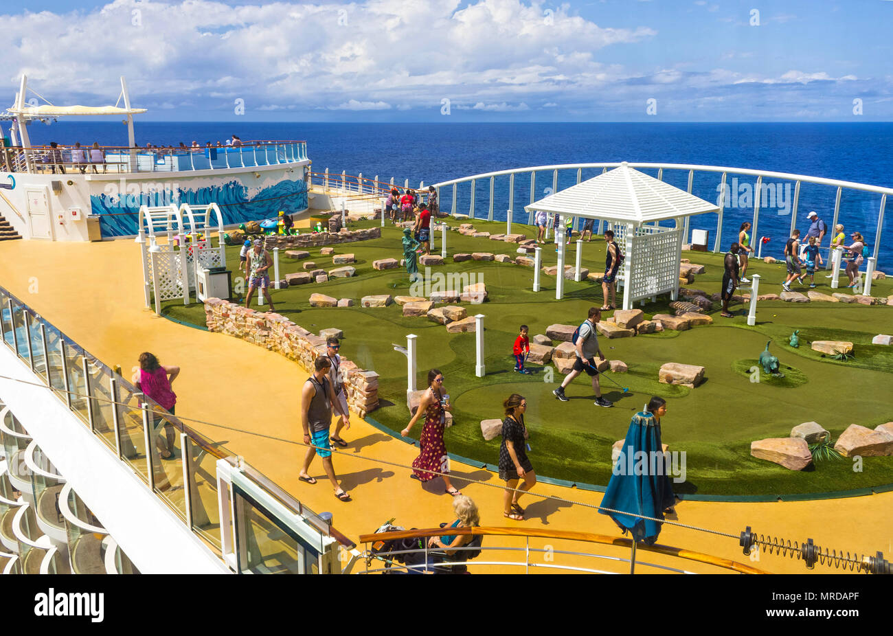 Cape Canaveral, USA - April 30, 2018: The upper deck with .mini golf court at cruise liner or ship Oasis of the Seas by Royal Caribbean Stock Photo