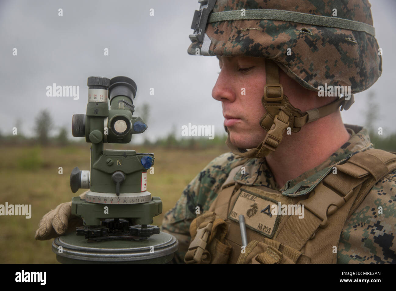 A fire direct controlman with Black Sea Rotational Force 17.1 levels his sight during Exercise Saber Strike 17 aboard Adazi Military Base, Latvia, June 5, 2017. The exercise is a multinational training evolution designed to increase interoperability between NATO allies and partner nations through combined-arms training. (U.S. Marine Corps photo by Sgt. Patricia A. Morris) Stock Photo