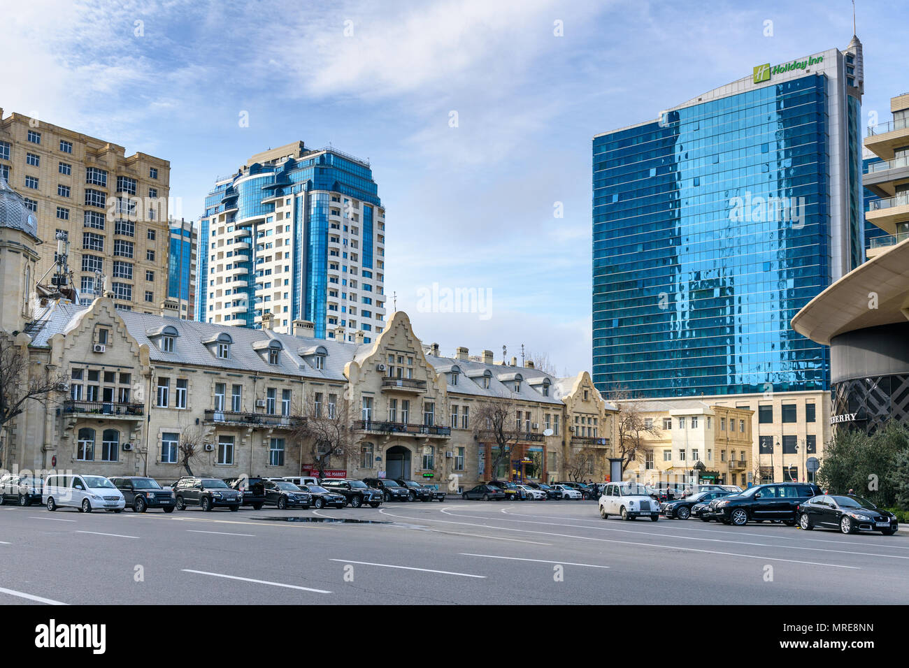 Baku, Azerbaijan - March 11, 2018: View on the street and Holiday Inn