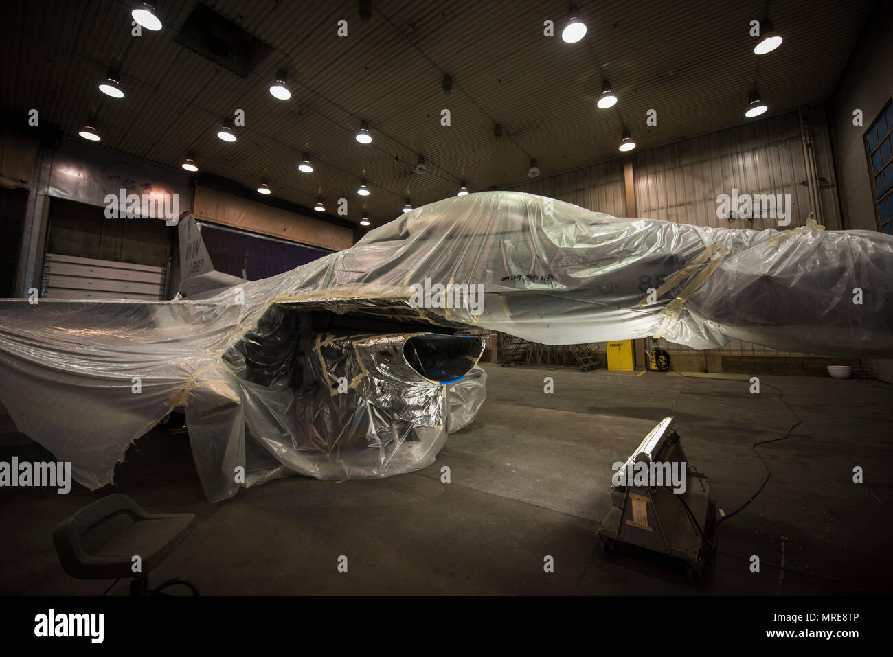 An F-16 Fighting Falcon assigned to Misawa Air Base, Japan, is prepped for additional paint coats at Eielson Air Force Base, Alaska, May 15, 2017. Airmen with the 35th Maintenance Squadron ensure the F-16 is capable to deliver rapid and precise airpower to protect and defend the Indo-Asia- Pacific region. (U.S. Air Force photo by Tech. Sgt. Araceli Alarcon) Stock Photo