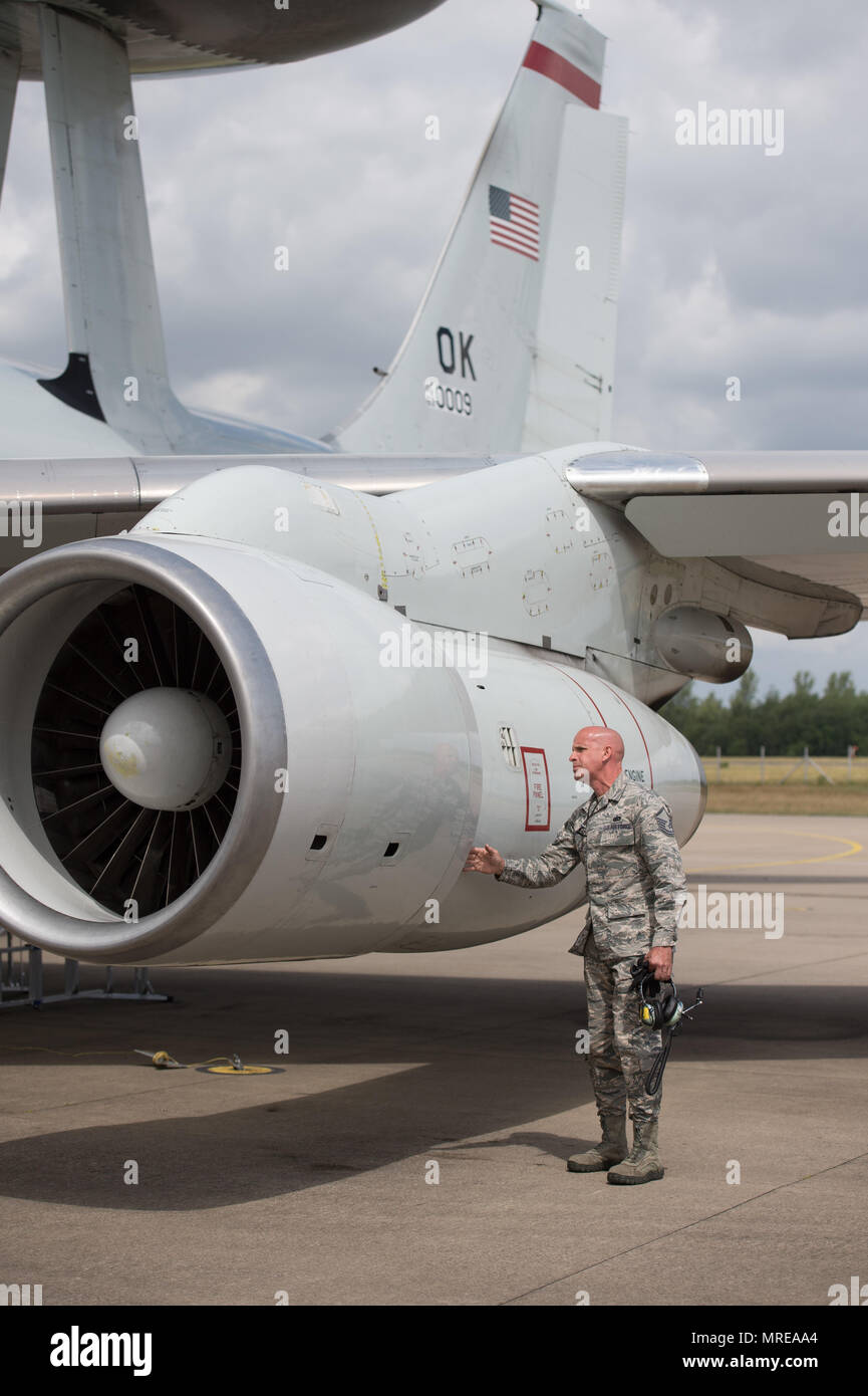 Master Sgt. Lloyd Braden, a crew chief assigned to the 513th Aircraft Maintenance Squadron, inspects an engine on an E-3 Sentry Airborne Warning and Control System aircraft June 12, 2017, at NATO Air Base Geilenkirchen, Germany, prior to a mission supporting the BALTOPS 2017 exercise. Braden is one of the nearly 100 Reservists supporting BALTOPS 2017, which involves 50 ships and submarines and 40 aircraft from 14 member nations. (U.S. Air Force photo/2nd Lt. Caleb Wanzer) Stock Photo