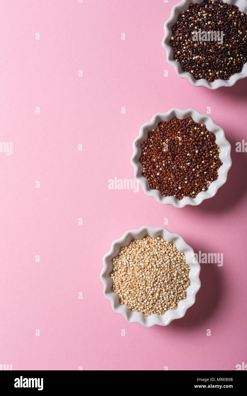 Quinoa in white bowls Stock Photo
