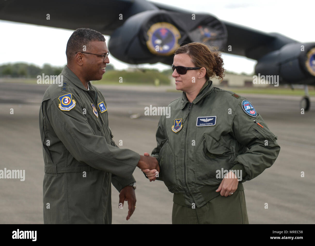 Lt. Gen. Richard Clark, 3rd Air Force commander, shakes the hand of an Air Force Global Strike Command Airman deployed to RAF Fairford, June 12, 2017. The simultaneous deployment of the B-1B Lancer, the B-2 Spirit and the B-52H Stratofortress marked the first time in history that all three strategic bomber aircraft were present in the European Theater. The aircraft were accompanied by approximately 800 Airmen as part of bomber assurance and deterrence operations. (U.S. Air Force photo by Senior Airman Curt Beach) Stock Photo