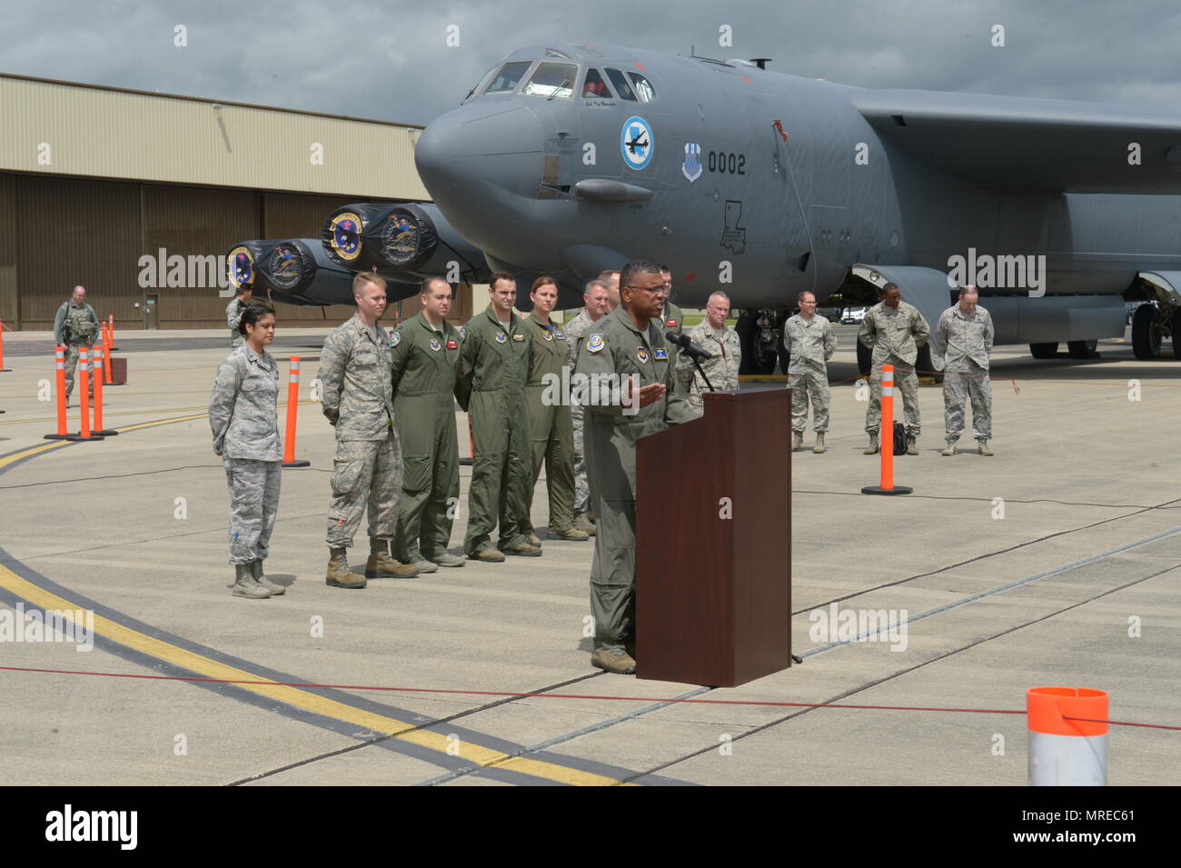 Lt. Gen. Richard Clark, 3rd Air Force commander, addresses news reporters in front of a 'tri-bomber' formation of a B-52H Stratofortress, a B-1B Lancer and a B-2 Spirit, during a media day event at RAF Fairford, U.K., June 12, 2017.  The event marked the first time in history that all three of Air Force Global Strike Command's strategic bomber aircraft simultaneously deployed to the European Theater as part of bomber assurance and deterrence operations. The forward presence of bomber aircraft and Airmen assists in maintaining high readiness for global reach capabilities. (U.S. Air Force photo  Stock Photo