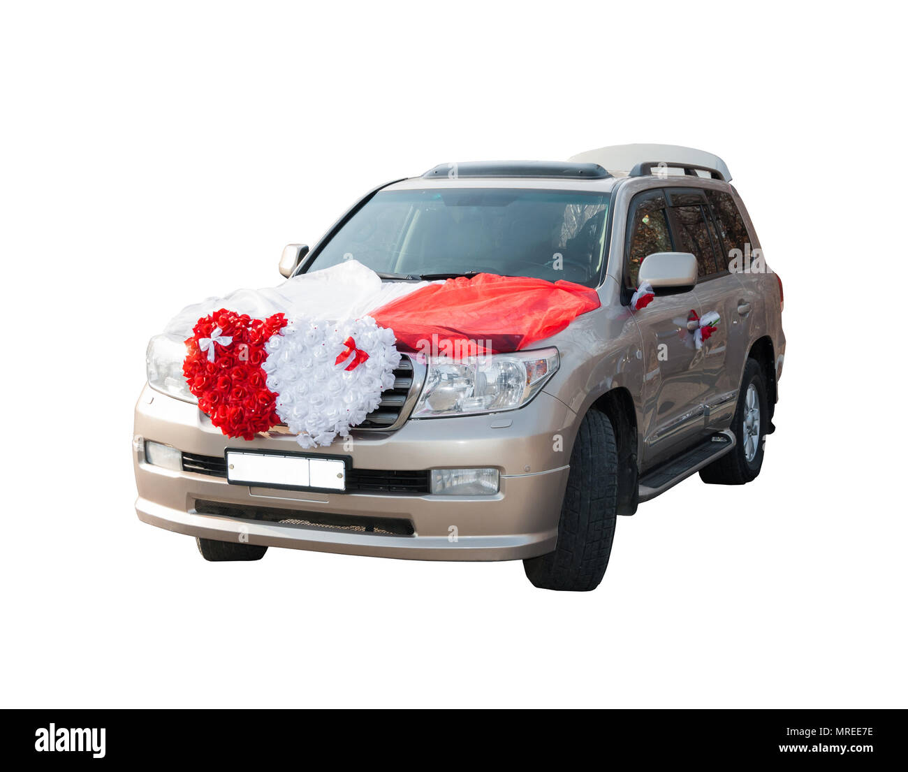 The wedding car decorated with flowers on a white background. Stock Photo