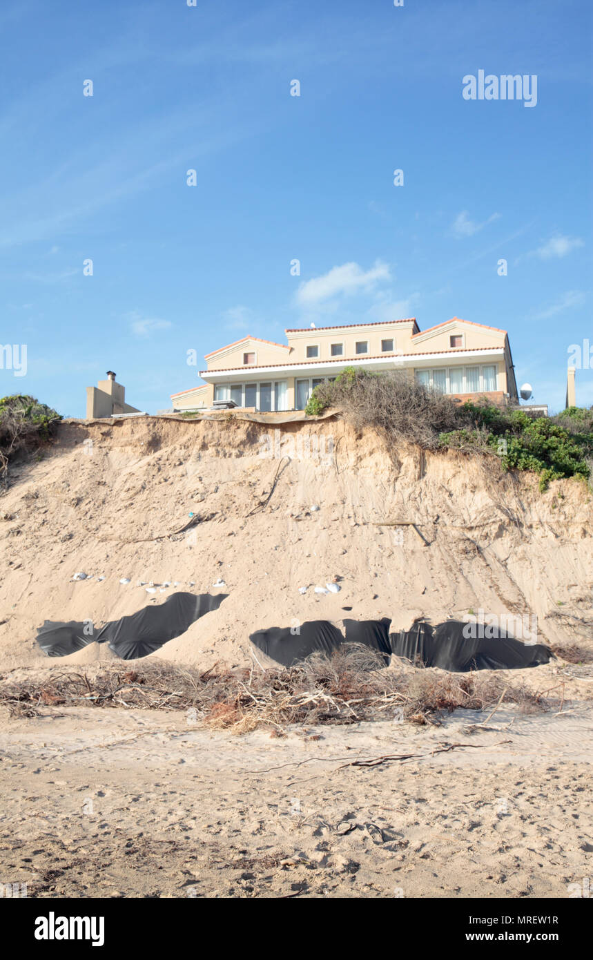 Eroding sand dunes caused by the removal of vegetation, Sedgefield, Western Cape, South Africa. Stock Photo