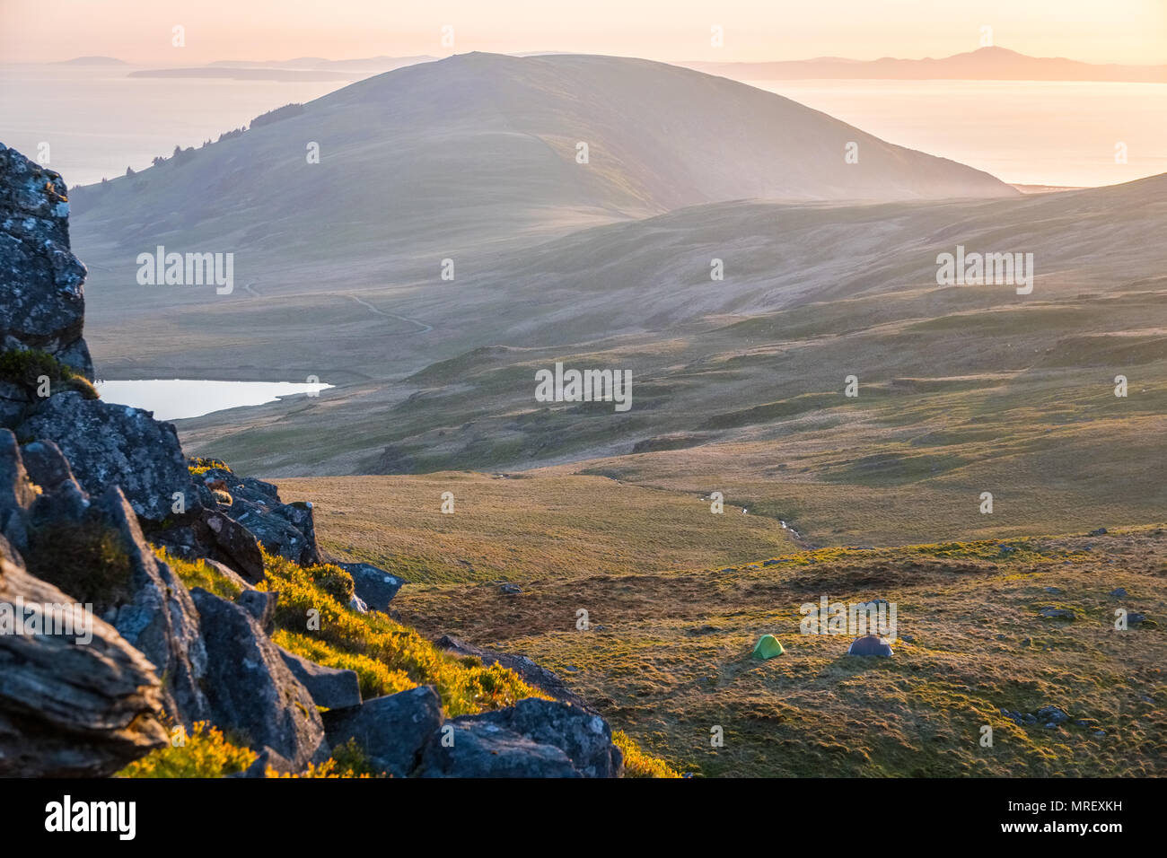 tent pitched on a Welsh mountain during a wild camping trip in the ...