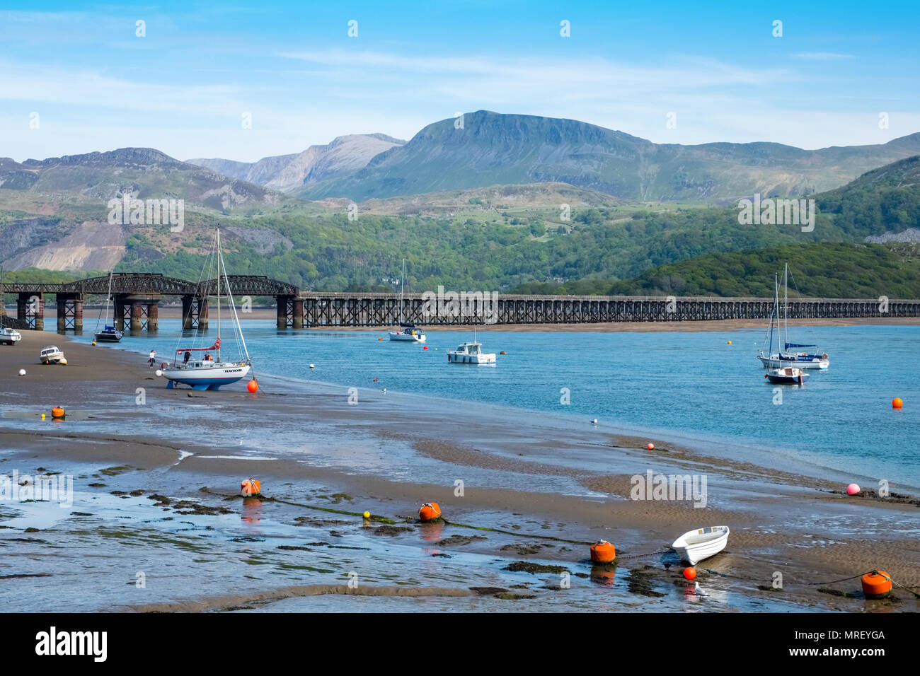 The Mawddach Estuary and the rail bridge , Barmouth in Mid Wales, uk,  with Cader Idris in distance. Stock Photo