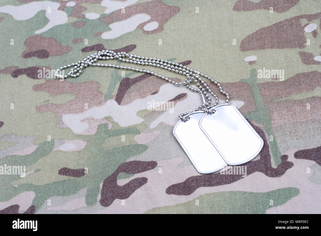 dog tag on multicam camouflage uniform Stock Photo - Alamy