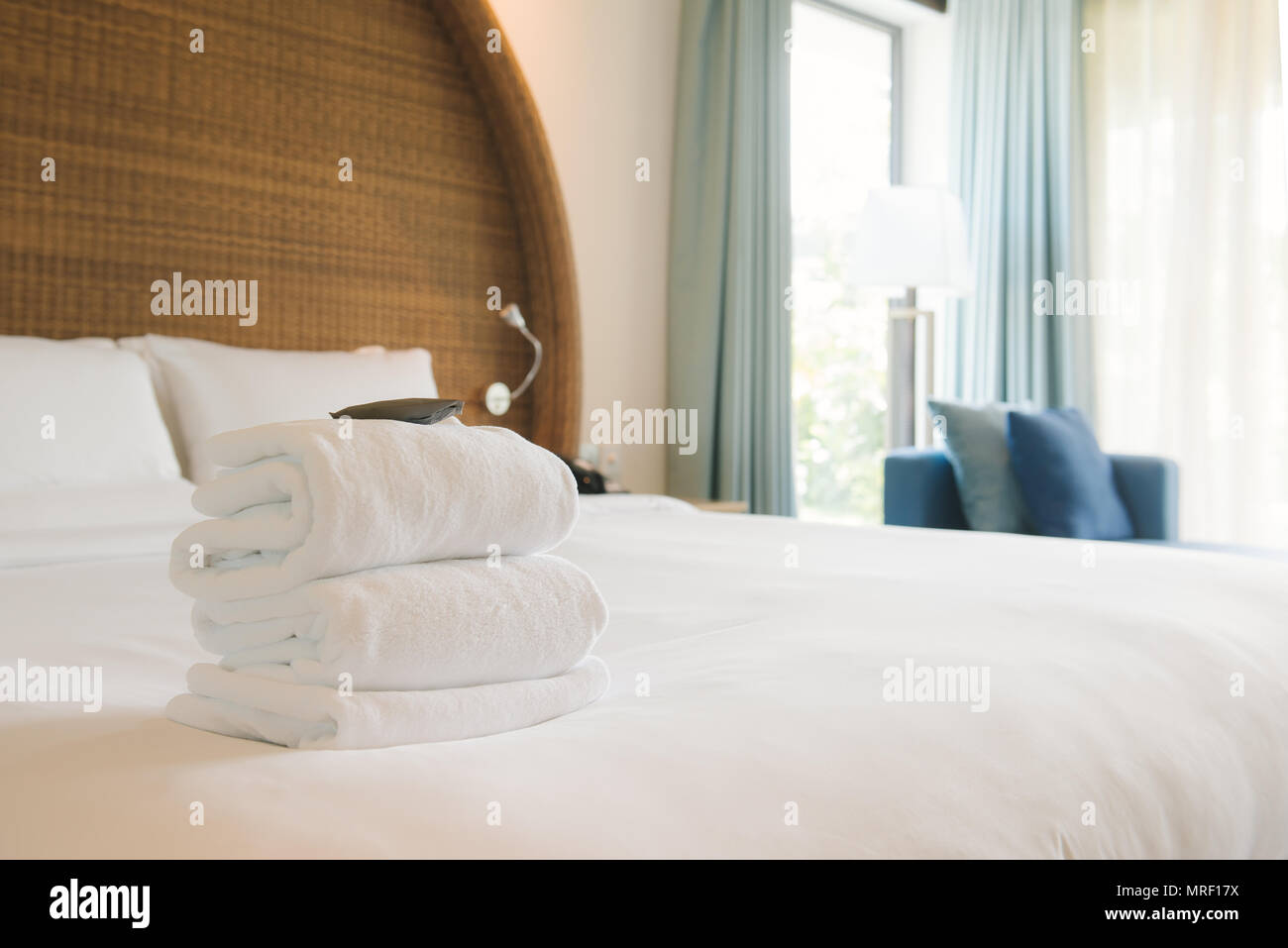 Closeup clean towels in hotel room hygiene and hospitality concept