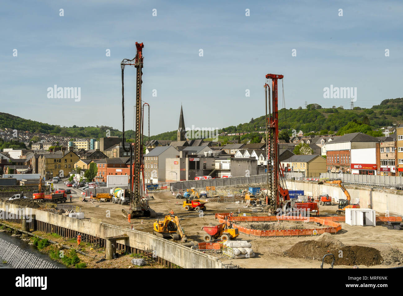 Drilling rigs and other construction plant working on the foundations of a new office