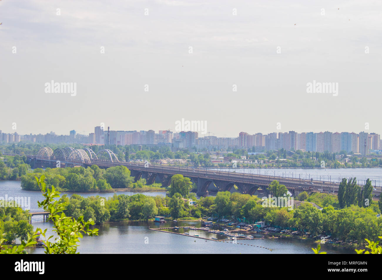 View of the city of Kiev from a height. City landscape. Overcast sky Stock Photo