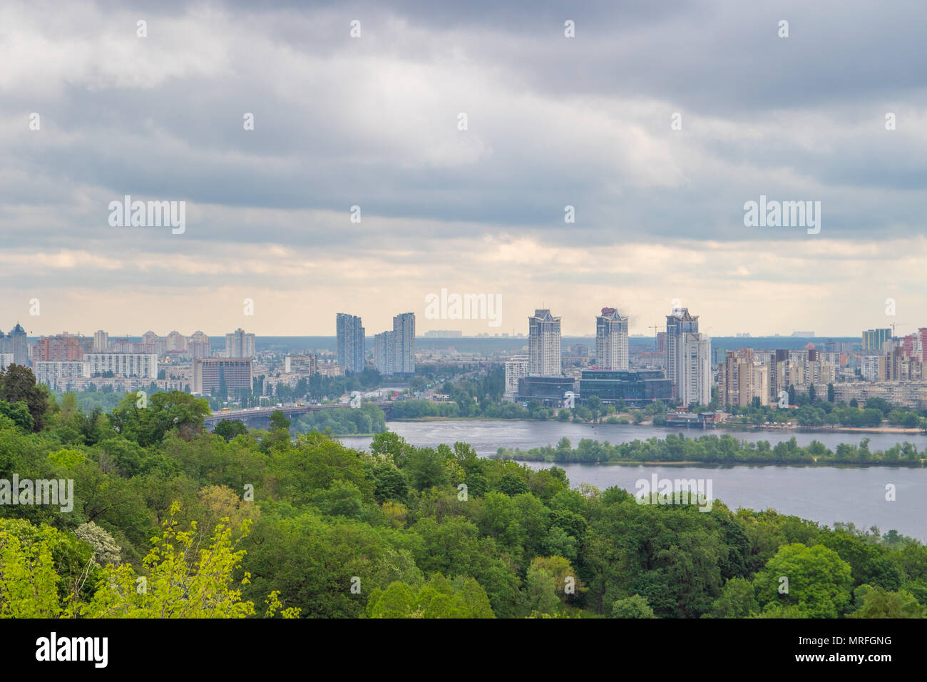 View of the city of Kiev from a height. City landscape. Overcast sky Stock Photo