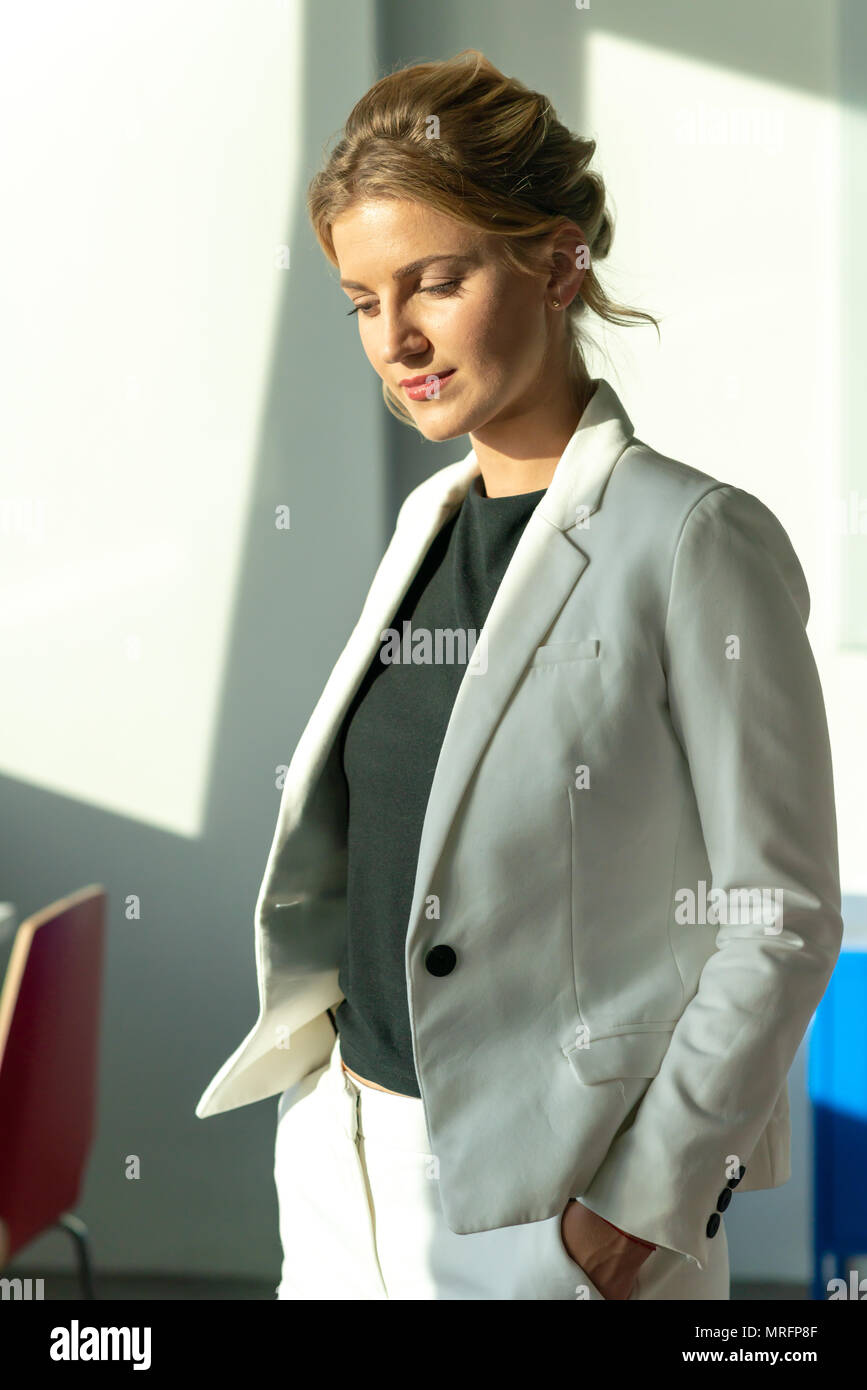 beautiful blonde in business suit business lady Stock Photo - Alamy