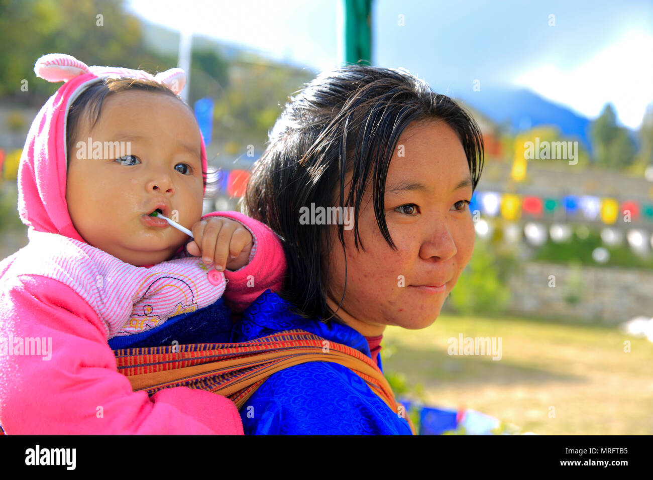 A Bhutanese mother and her child at National Memorial Chorten in