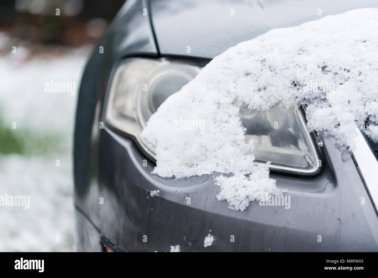 car headlight under the snow winter Stock Photo Alamy
