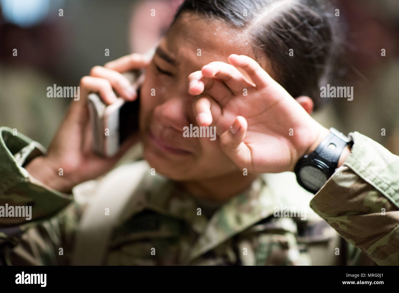 U.S. Army Trainee assigned to Foxtrot 1st Battalion 34th Infantry Regiment calls home on the first day of Basic Combat Training on 12 June 2017 at Fort Jackson, SC. Among those assigned to the 1st Battalion, 34th Infantry Regiment are Reserve Drill Sergeants from the 3rd Battalion, 518th Infantry Regiment who are required to serve two weeks for annual training (U.S. Army photo by Spc. Darius Davis/Released). Stock Photo