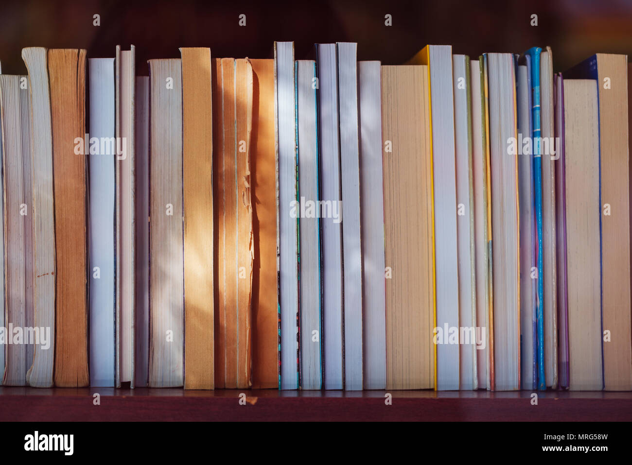 Used books on the bookshelf in library Stock Photo Alamy