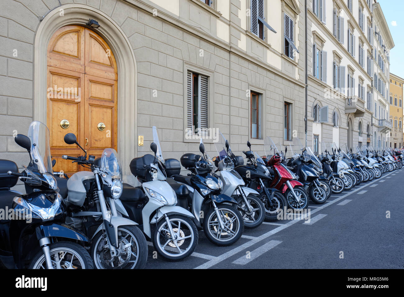 Line of parked Motor bikes and scooters, Florence, Tuscany, Italy, Europe, Stock Photo