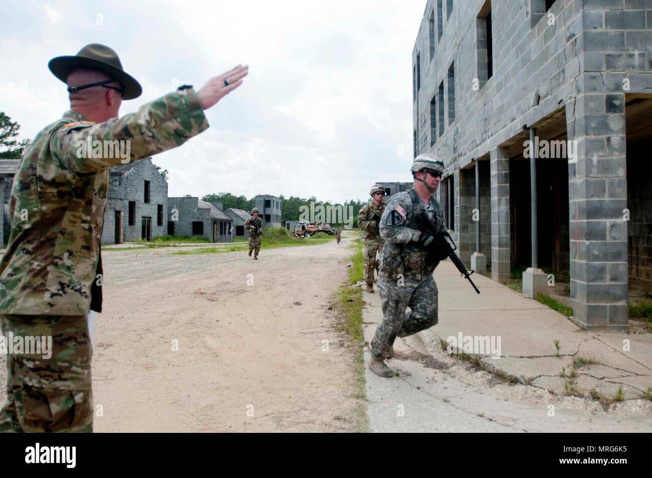 Drill sergeants participate in a demonstration of one of the events at the 2017 U.S. Army Reserve Best Warrior Competition at Fort Bragg, N.C. June 10. This year’s Best Warrior Competition will determine the top noncommissioned officer and junior enlisted Soldier who will representthe U.S. Army Reserve in the Department of the Army Best Warrior Competition later this year at Fort A.P. Hill, Va. (U.S. Army Reserve photo by Spc. Trenton Fouche) (Released) Stock Photo