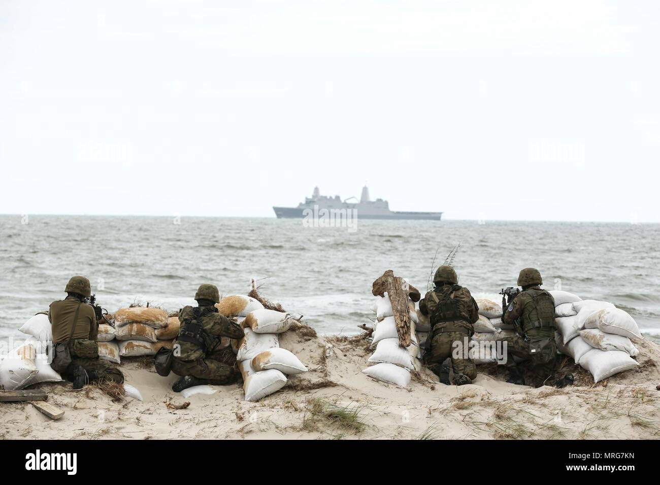 170614-N-PF515-003  USTKA, Poland (June 14, 2017) Polish sailors participate in an amphibious landing demonstration during exercise BALTOPS 2017. The premier annual maritime-focused exercise is conducted in the Baltic region and is one of the largest exercises in Northern Europe.  (U.S. Navy photo by Chief Mass Communication Specialist America A. Henry/Released) Stock Photo