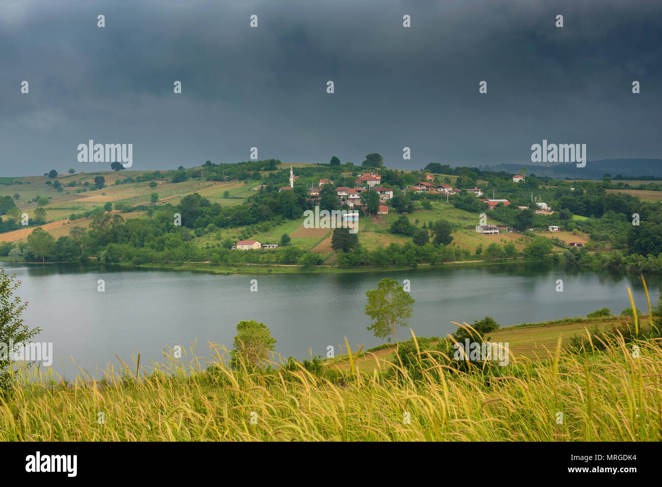 irrigation dam and Turkish farm village Stock Photo - Alamy