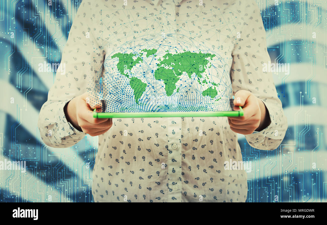 Young woman holding tablet showing social network structure hologram. Business technology expansion and globalization concept. International communica Stock Photo