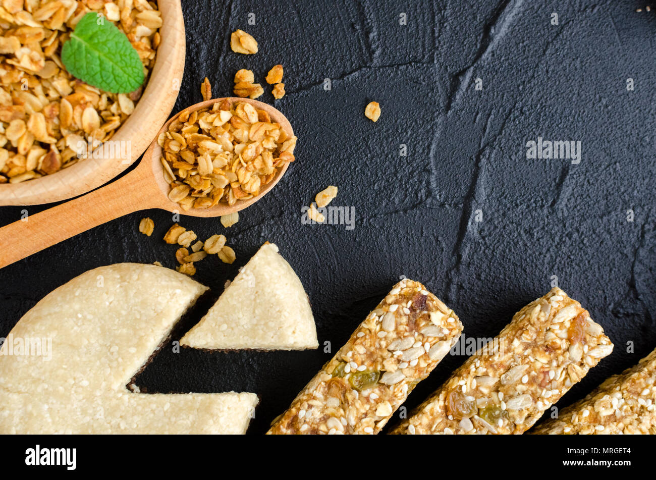 Healthy snacks. Fitness food. Sesame halva. Bowl and spoon with oat