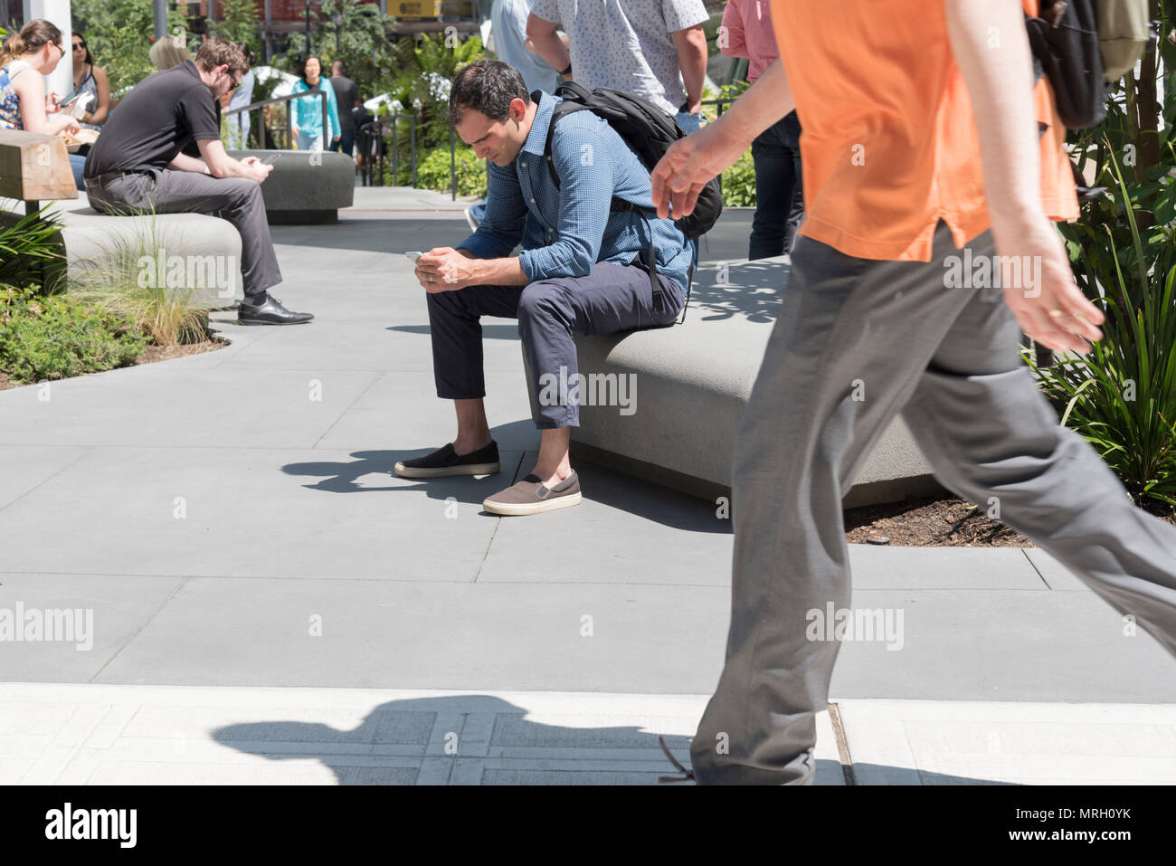 Amazon employees in Seattle using technology on the world headquarters