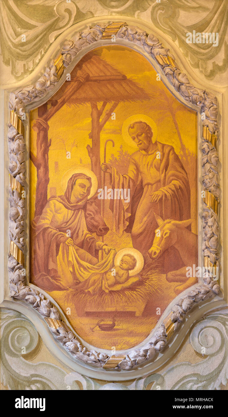 MODENA, ITALY - APRIL 14, 2018: The freso of Nativity in church Chiesa di San Bartolomeo from 17. cent. Stock Photo