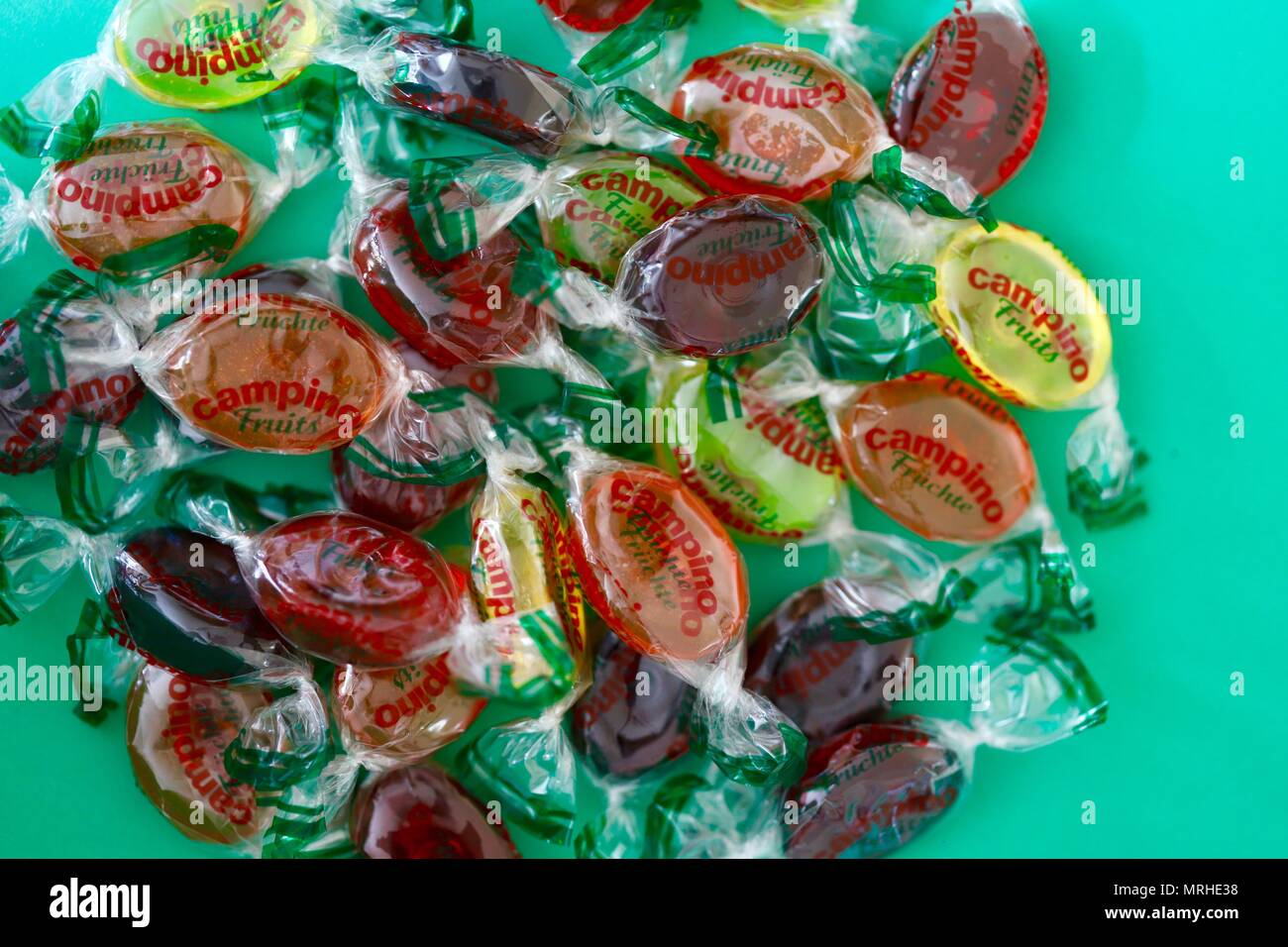 Campino boiled fruit flavoured sweets on a turquoise background Stock ...