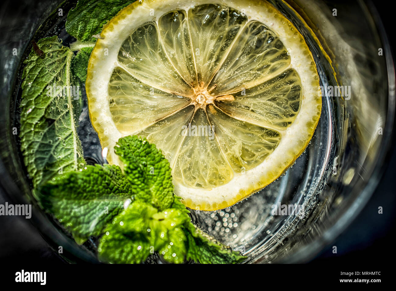 Mineral water with lemon and mint Stock Photo