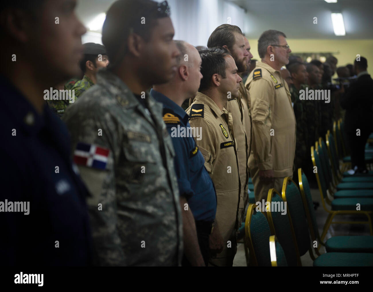PORT OF SPAIN, Trinidad - Canadian Armed Forces members stand at attention as the Trinidad and Tobago Chief of Defence Staff arrive during Exercise TRADEWINDS 17 closing ceremony in Chaguaramas, Trinidad and Tobago on June 17, 2017. (Canadian Forces Joint Imagery Centre photo by Avr Desiree T. Bourdon) Stock Photo