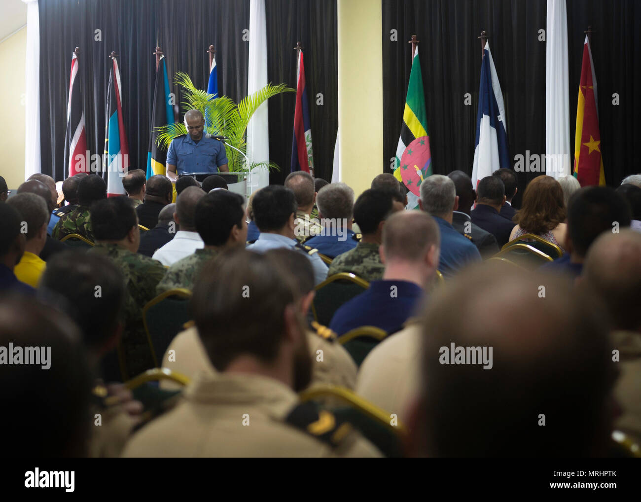 PORT OF SPAIN, Trinidad - Captain (Navy) Hayden Pritchard, Trinidad and Tobago Chief of Defence Staff, addresses attendees during Exercise TRADEWINDS 17 closing ceremony in Chaguaramas, Trinidad and Tobago on June 17, 2017. (Canadian Forces Joint Imagery Centre photo by Avr Desiree T. Bourdon) Stock Photo