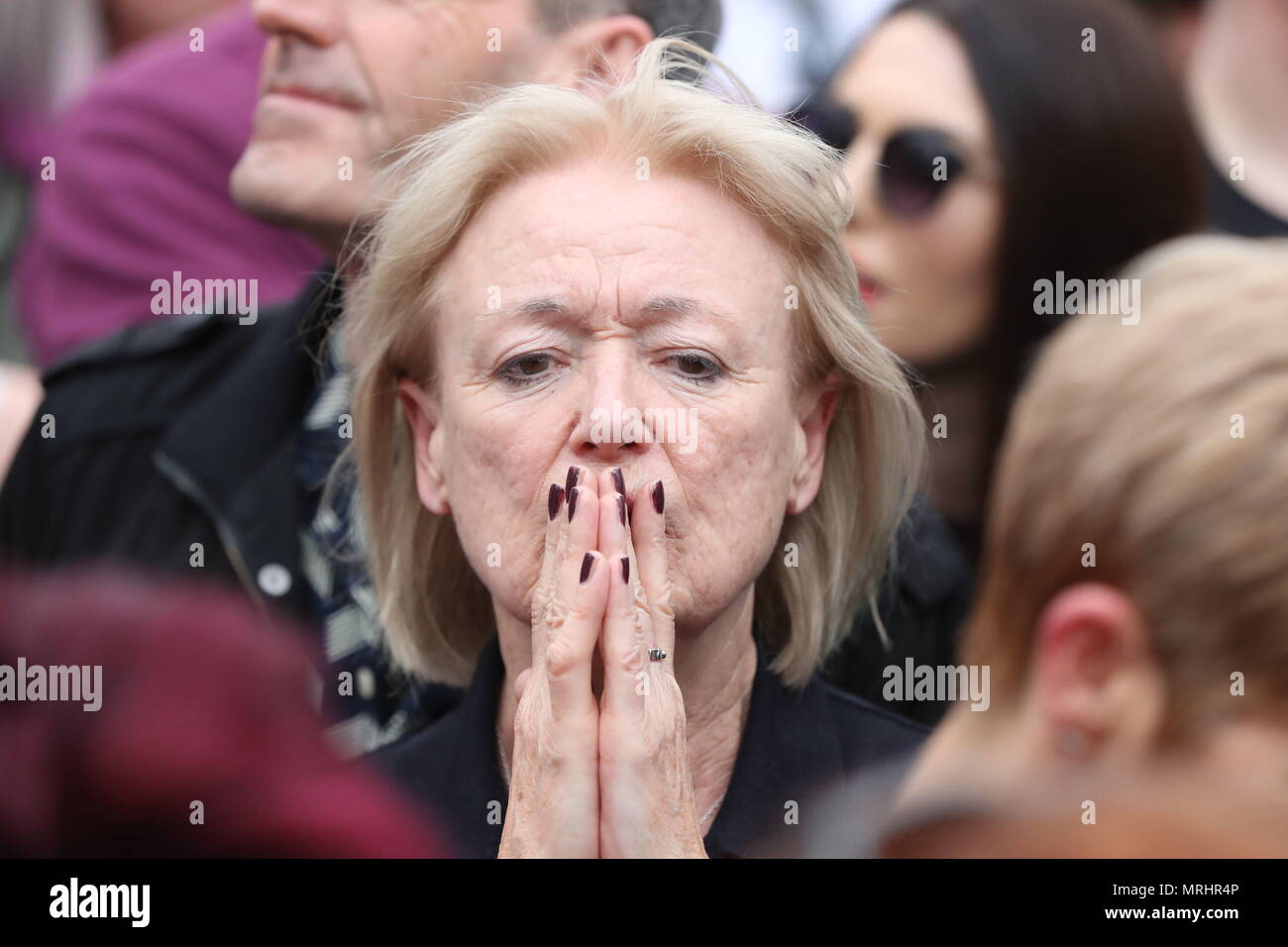 A campaigner listens to the announcement of the final referendum results as Ireland has voted to repeal the 8th Amendment of the Irish Constitution which prohibits abortions unless a mother's life is in danger. Stock Photo