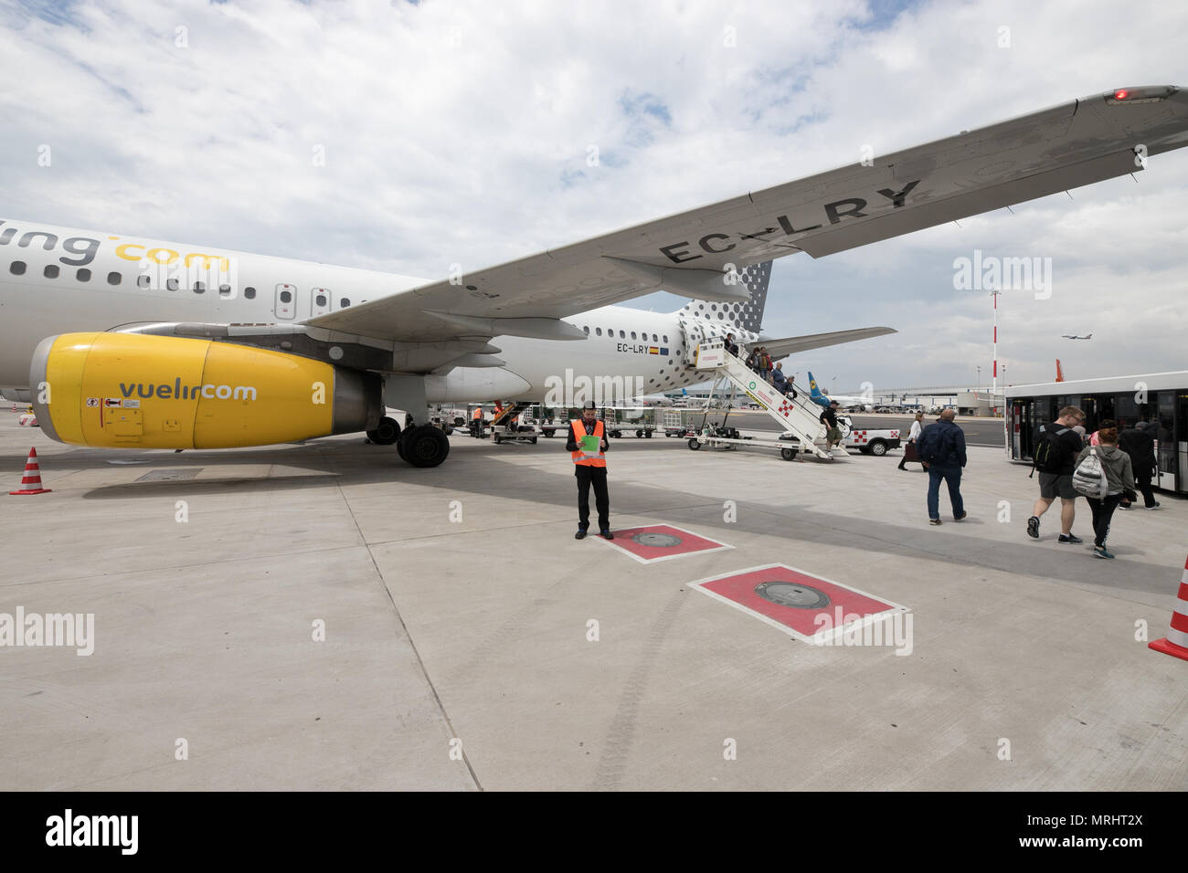 Vueling airplane, Barcelona Airport, waiting for passengers Stock Photo