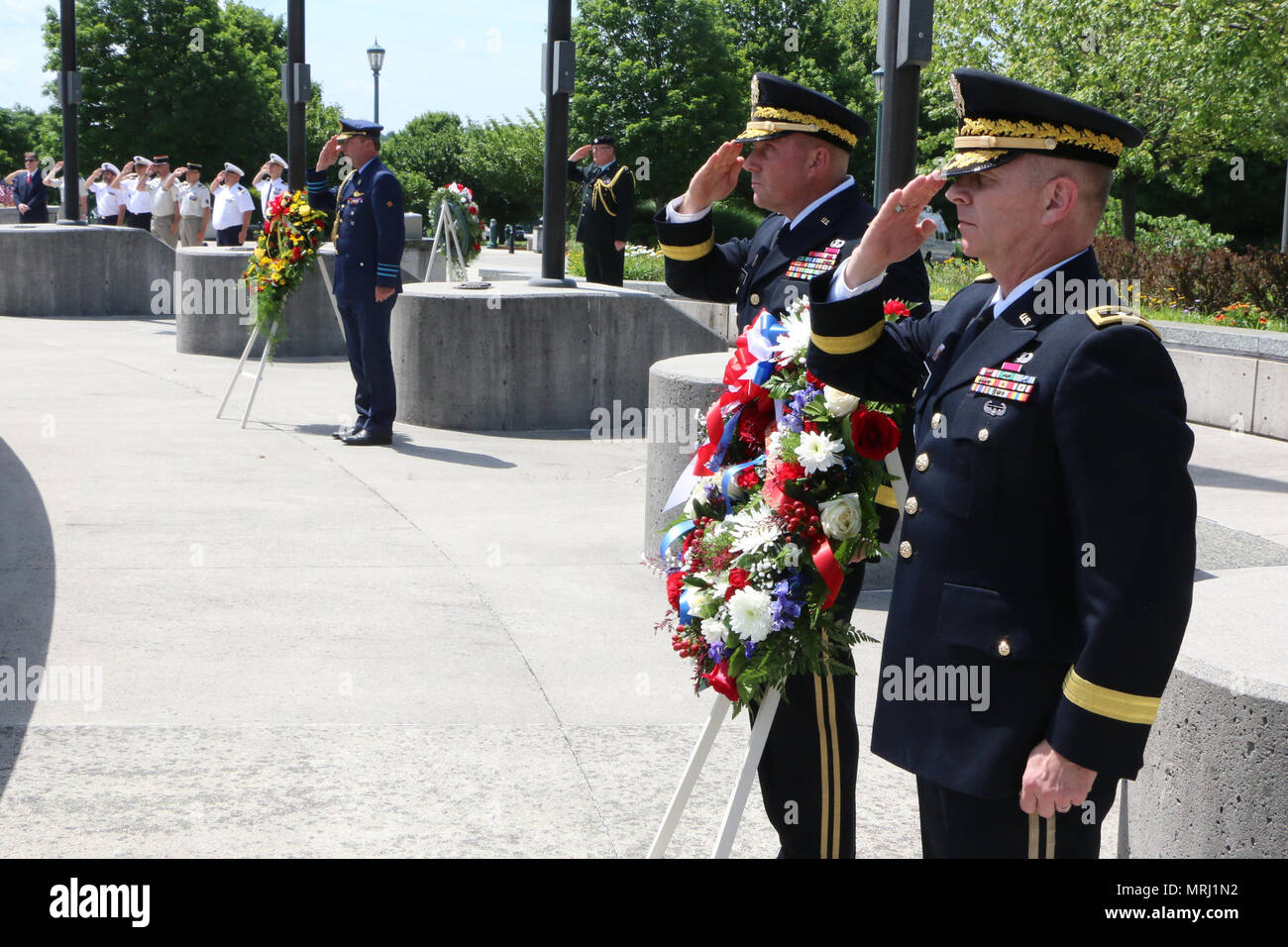 Maj. Gen. Timothy P. Williams, the Adjutant General of Virginia, and Brig. Gen. Walter Mercer, Virginia National Guard Assistant Adjutant General - Army, place a wreath honoring U.S. Armed Forces at the National D-Day Memorial June 6, 2017, in Bedford, Virginia. (U.S. National Guard photo by Cotton Puryear) Stock Photo