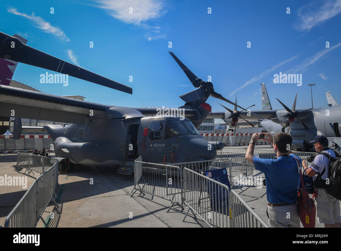 A CV-22 Osprey from the 352nd Special Operations Wing, Royal Air Force Mildenhall, is displayed in the U.S. corral at the Paris Air Show June 20, 2017 at Le Bourget, France. Aside from the CV-22, the U.S. is displaying an F-35A Lightning II, an F-16 Fighting Falcon, a CH-47 Chinook, an AH-64 Apache, a P-8 Poseidon, and a C-130J Super Hercules. The Paris Air Show offers the U.S. a unique opportunity to display their leadership in aerospeace and technology on an international scale. (U.S. Air Force photo/ Tech. Sgt. Ryan Crane) Stock Photo