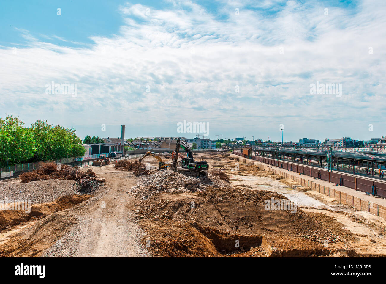 Tracked excavator working on construction site in Luxembourg Stock Photo