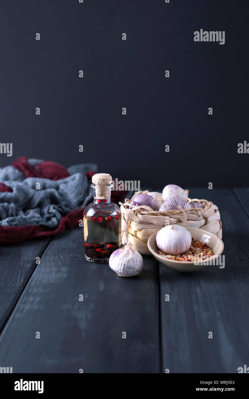 Garlic Cloves and Bulb in vintage wooden bowl. Copy cpace Stock Photo ...