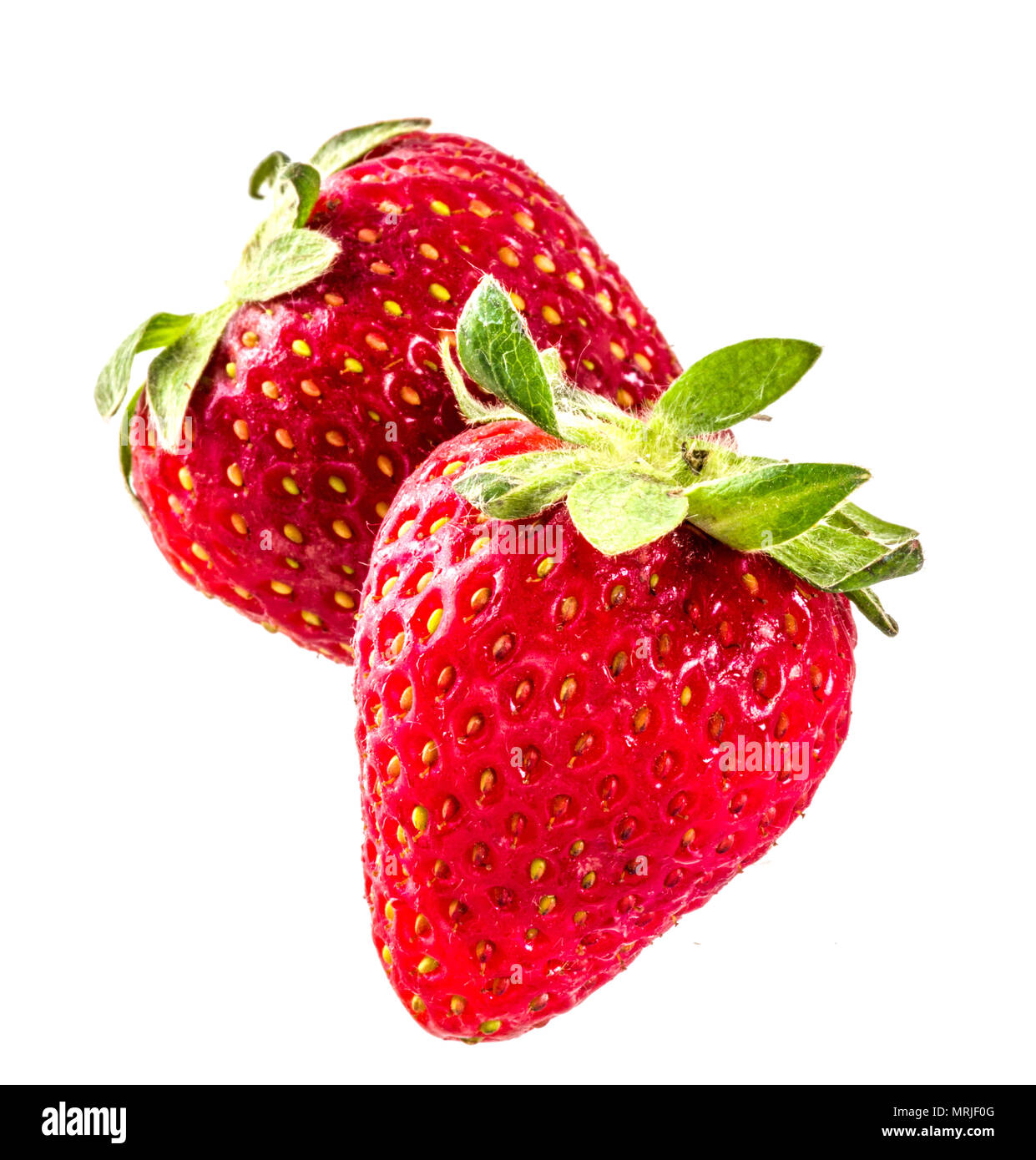 Raw strawberry isolated on white Stock Photo - Alamy